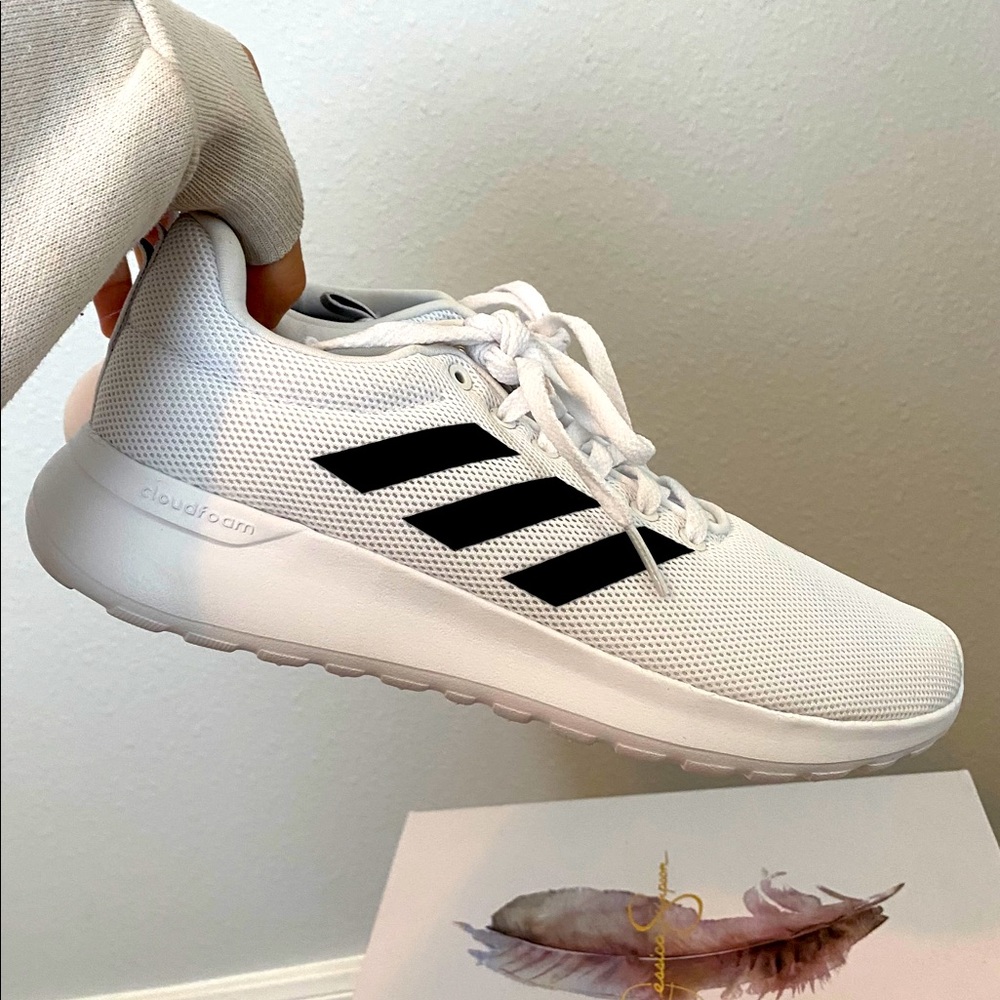 Black and white Adidas Cloudfoam shoes